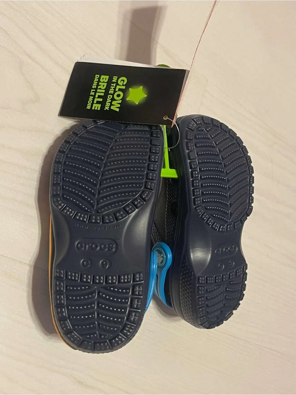 CROCS Kids Navy Light Up Clogs with Blue Straps and Orange-Yellow Space Accents